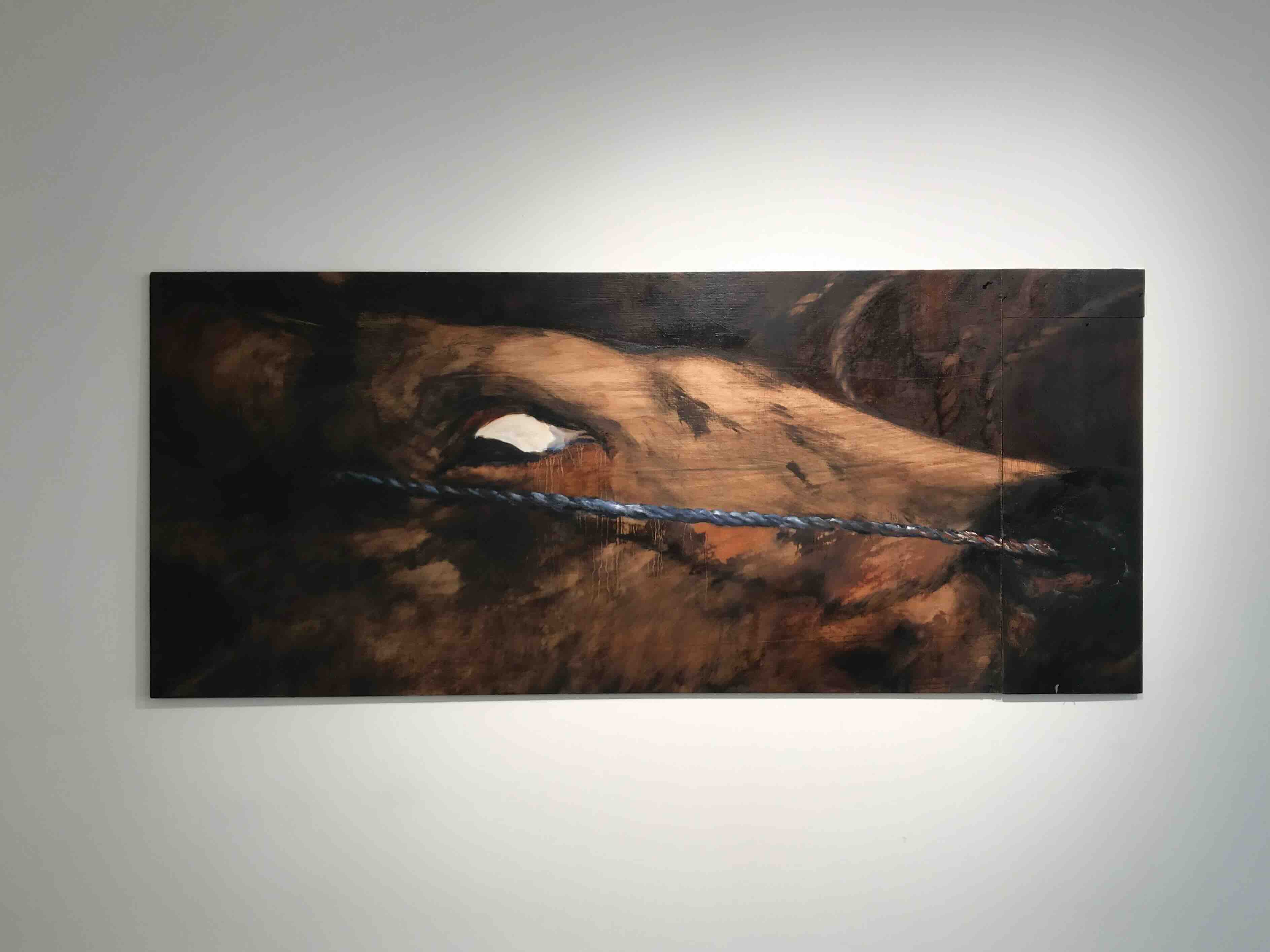 between slumped shoulders held the moon in waiting